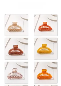 Detailed view of 6 colorful semi-circular hair claws with 9cm size measurements