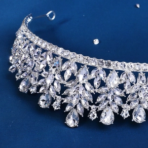 Detailed close-up of sparkling silver crystal bridal crown with pear-shaped rhinestones