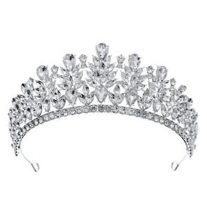 Macro detail of bridal crown featuring teardrop and marquise cut crystals on silver base