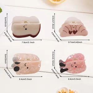 Tabella taglie delle pinze per capelli a forma di pane con motivi toast e croissant variati