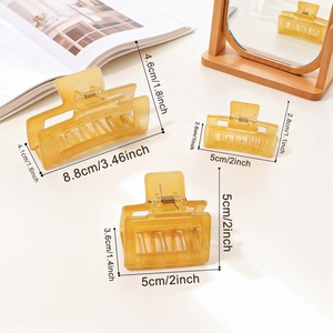 Three-piece set of transparent amber hair claw clips in square and long rectangle shapes