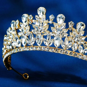 Elegant gold wedding crown with sparkling marquise and teardrop crystals for bridal hair