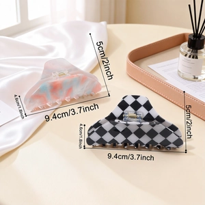 Large hair claw clips with marble and checkerboard patterns measuring 9.4cm for women