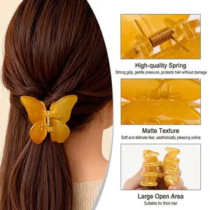 Translucent yellow butterfly hair claw clip with matte finish for thick hair
