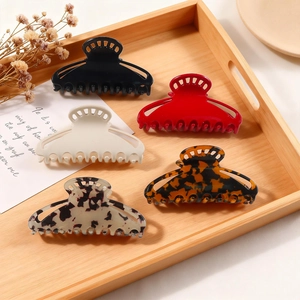 Set of five elegant large hair claw clips in assorted colors for modern women