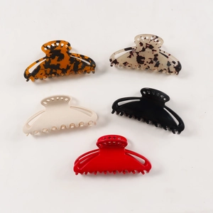 Set of large hollow hair claw clips in tortoiseshell, white, black and red for women