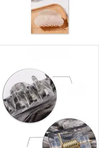 Detail of 8.7cm marble hair claw clip with gradient glitter and strong metal spring