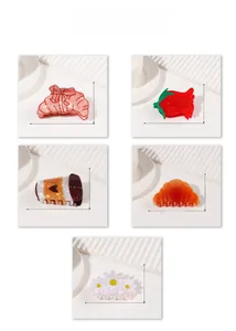 Detailed size specifications for vintage resin hair claw clips in various pastry shapes