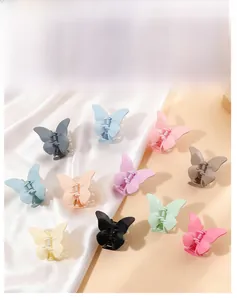 Collection détaillée de pinces à cheveux papillon mates en onze tons pastel doux