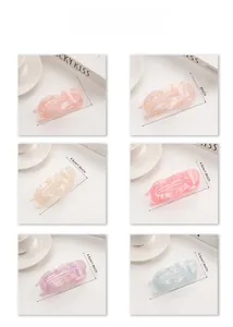 Detailed size view of six iridescent wave hair claws for elegant hairstyling