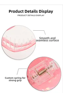 Detailed view of pink heart hair claw clip with strong spring and smooth teeth