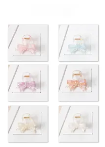 Detailed size specifications for 3D bow hair claws in six iridescent jelly colors