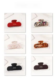 Detailed size chart for textured shark clips showing 9.4cm length and various colors