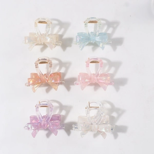 Set of 6 elegant 3D bow hair clips in pastel jelly colors with iridescent pearly finish