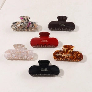 Set of 6 textured hair claws in assorted colors with France Handmade branding