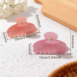 Pink jelly hair claw clips with glitter texture for women, size 10cm x 5cm shown in pairs