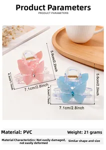 Pinces à cheveux papillon en PVC avec strass et indication du poids de 21g