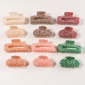 Elegant terrazzo textured hair claw clips in various colors and geometric shapes