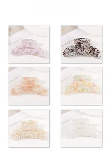Collection de pinces à cheveux en acétate avec motifs de vagues d'eau et écaille
