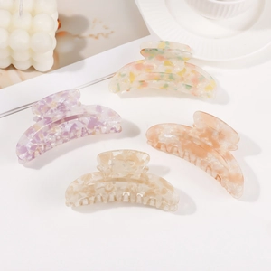 Lot de quatre pinces à cheveux en acétate avec motif ondulé et texture marbrée pastel