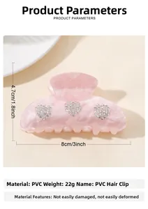 Detail showing the pink heart-shaped rhinestone hair claw dimensions of 8cm by 4.7cm