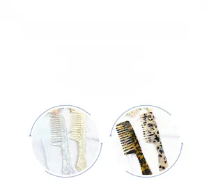 Detail of cellulose acetate hair combs in marble, tortoiseshell and leopard patterns