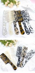 Detail of assorted tortoise shell and marble acetate wide-tooth combs with ergonomic handles