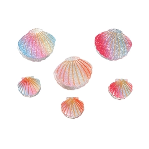 Colorful iridescent shell hair claws with glitter finish in multiple sizes and dreamy hues