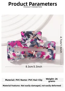 Détail de la pince à cheveux en PVC à motif marbré de 8,3 cm, texture résistante