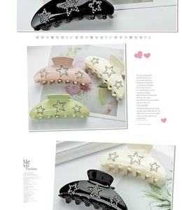Detail of 9cm hair claw clips with star rhinestone patterns in multiple colors