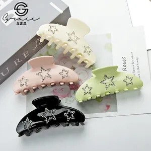 Set of 9cm large hair claws in four colors featuring elegant star rhinestone patterns