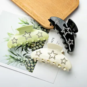 Glossy 9cm hair claw clips set with rhinestone star patterns in green, black, and cream