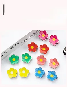 Set of 12 colorful 2cm mini flower hair claws in vibrant acrylic colors