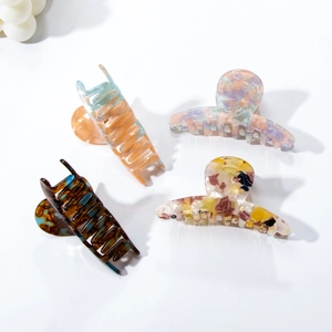 Elegant PVC 7cm hair claw set in four colors including tortoise shell and purple marble