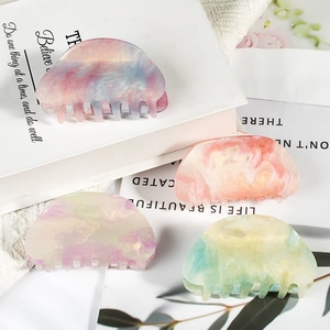 Lot de quatre pinces à cheveux pastel à effet marbré et paillettes dorées pour femmes
