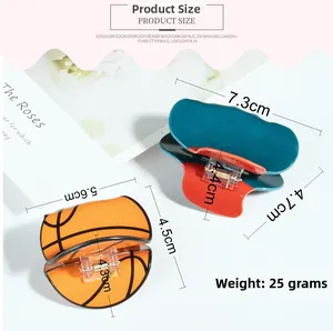 Größentabelle für Basketball-Haarspangen mit Maßen von 7.3cm und 5.6cm für Damen und Kinder
