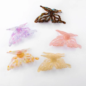 Set of 5 colorful butterfly hair claws in acetate finish with marble and candy tones
