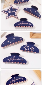Detailed macro view of navy blue velvet hair claw clips with gold Bride lettering