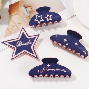 Elegant navy blue hair claw clip set with starry patterns and Julymansion branding