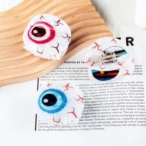 Pinces à cheveux amusantes en forme de globe oculaire avec motifs iris rouge et bleu