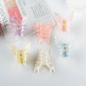 Colorful 6-piece set of translucent butterfly hair claws with iridescent pearl finish