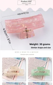 Detailed view of large marble texture hair claw clip with size and weight dimensions