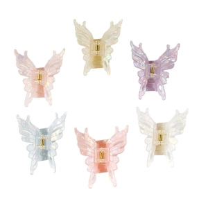 Set of six iridescent butterfly hair claws in pastel colors with gold metal springs