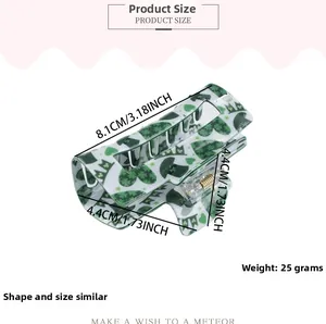 Detailed size chart showing dimensions of the St. Patrick's clover hair claw clip