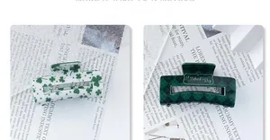 Detail of St. Patrick's Day hair claw clips with green shamrock and argyle patterns