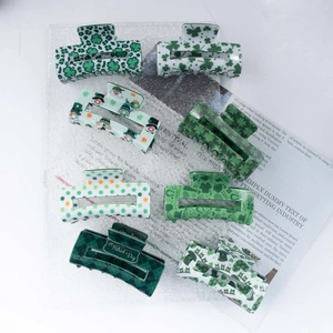 8-piece St. Patrick's Day clover claw clip set in various green shamrock patterns