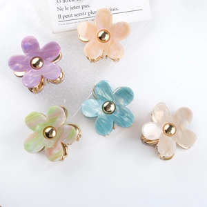 Molle per capelli a forma di fiore in colori pastello con trama effetto marmo