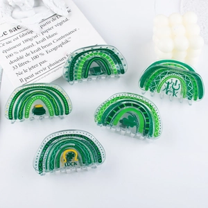 Set de pinzas para el cabello de San Patricio con tréboles y patrones de arcoíris