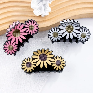 Lot de trois pinces à cheveux florales avec motifs de tournesol en rose, blanc et jaune