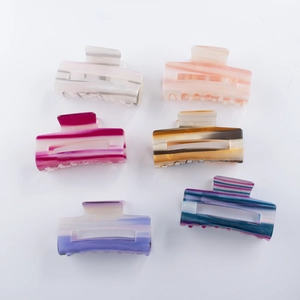 Set of 6 rectangular acetate hair claws with marble texture in various colors